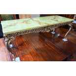 A composite simulated green onyx and giltwood coffee table, 122 cm wide x 46 cm deep x 48 cm high