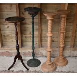 A pair of beech barley-twist torchere stands, 102 cm high, to/w reproduction mahogany example with