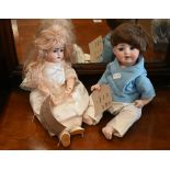 Two German bisque-headed dolls - one stamped 'PM194', the other '1/192/4' (2)