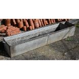 A large vintage galvanised cattle trough, 242 x 48 x 40 cm h