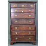 A George III mahogany chest on chest of three short over three long graduated drawers flanked by