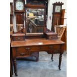 A late Victorian carved mahogany mirror back dressing table, 122 cm wide x 58 cm deep x 168 cm high