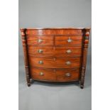 Victorian cross-banded mahogany chest of two short over three long graduated drawers, flanked by