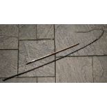 A vintage lunging whip with braided leather handle and EP pommel, to/w a walking stick with a