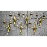A set of six gilt metal twin branch foliate wall sconce in the Louis XV style (box)