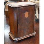 A 19th century mahogany table cabinet fitted with three sliding galleried shelves, on bracket