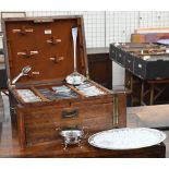 An oak cutlery canteen, containing a set of six each Hanoverian table knives and tea knives with