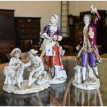 A pair of Sitzendorf porcelain figures of an 18th century lady and gentleman, 17/14cm high, to/w a