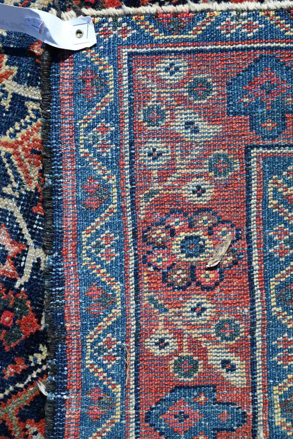 An old Persian Mahal rug, the blue ground centred by a medallion, 202 cm x 140 cm - Image 3 of 3