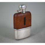 A hip-flask with hinged silver top, leather cover and detachable silver beaker, Hubert Hall,