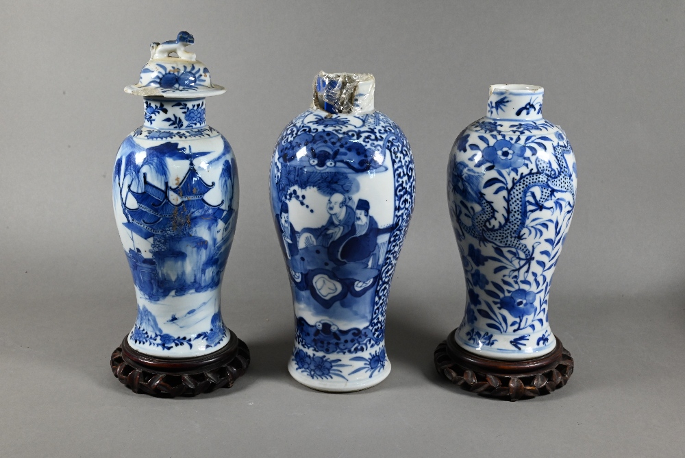 A 19th century Chinese blue and white baluster vase painted in underglaze blue with figures in - Image 2 of 10