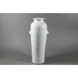 A 17th century Chinese Dehua or blanc-de-chine sleeve vase of tapering cylindrical form with short