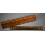 A vintage brass rolling ruler by UWW, Birmingham, 46 cm in stained pine case