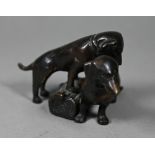 A brown bronze sculpture of two puppies, 6 cm h