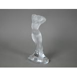 A Lalique frosted glass figure of a standing female nude, etched 'Lalique, France', 24 cm high