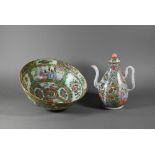 A Chinese Canton famille rose teapot and cover, the pear-shaped body painted with figures and