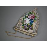 A circa 1900 ladies beadwork bag of shaped form, the glass bead and cut steel decoration depicting