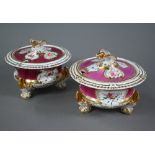 Two 19th century china sauce tureens and covers of similar design, with eagle finials and swan feet,