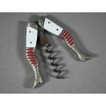 WITHDRAWN A Belle Epoque vintage novelty 'legs' corkscrew with white enamel thighs and red-striped