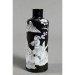 A 19th century Chinese black ground en-grisaille porcelain snuff bottle of high shouldered