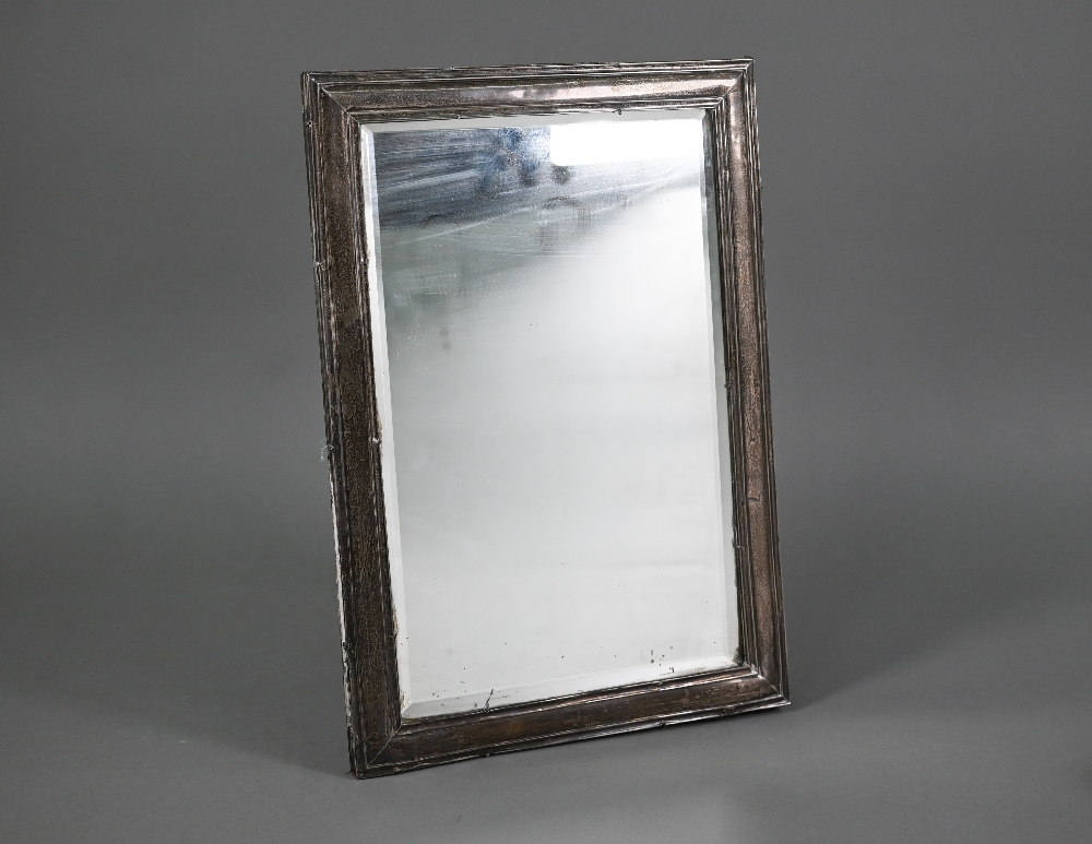 A large easel mirror with moulded silver frame and bevelled plate, William Devenport, Birmingham