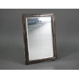 A large easel mirror with moulded silver frame and bevelled plate, William Devenport, Birmingham