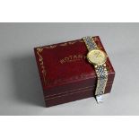 A Rotary gents gold plated and stainless steel wristwatch, with extra links, and box