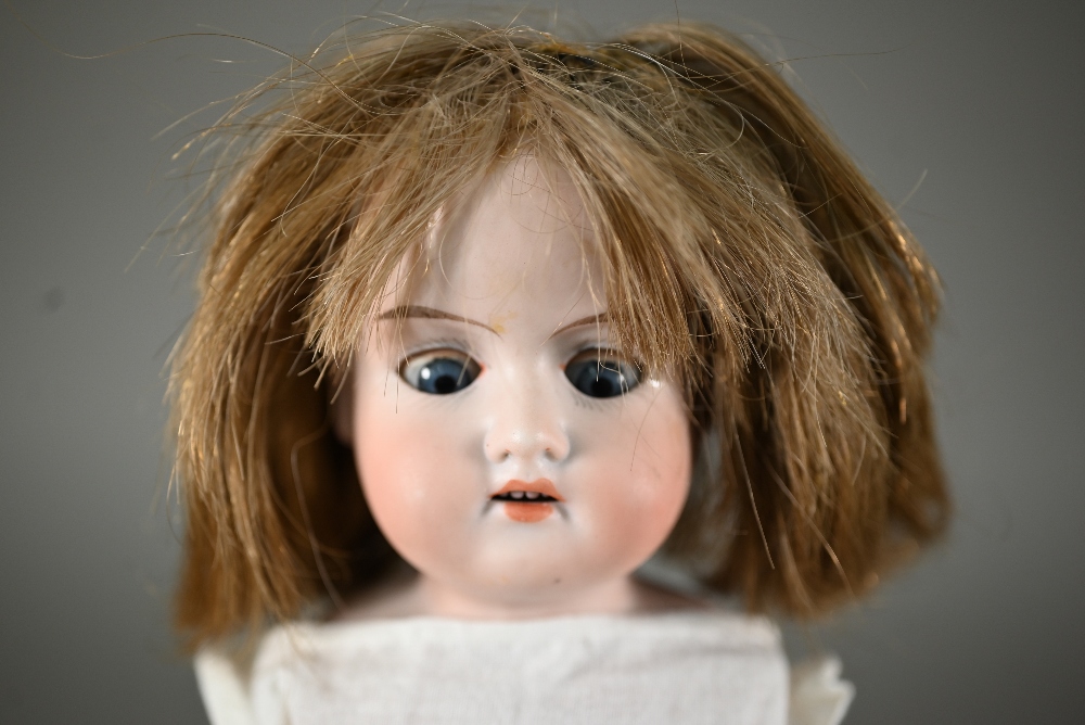 An Armand Marseille AM351/3 1/2 k bisque-headed baby doll with fixed blue eyes and open mouth with - Image 8 of 10