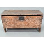 A 17th century lunette carved and distressed six plank coffer, 91 cm x 35 cm x 50 cm h