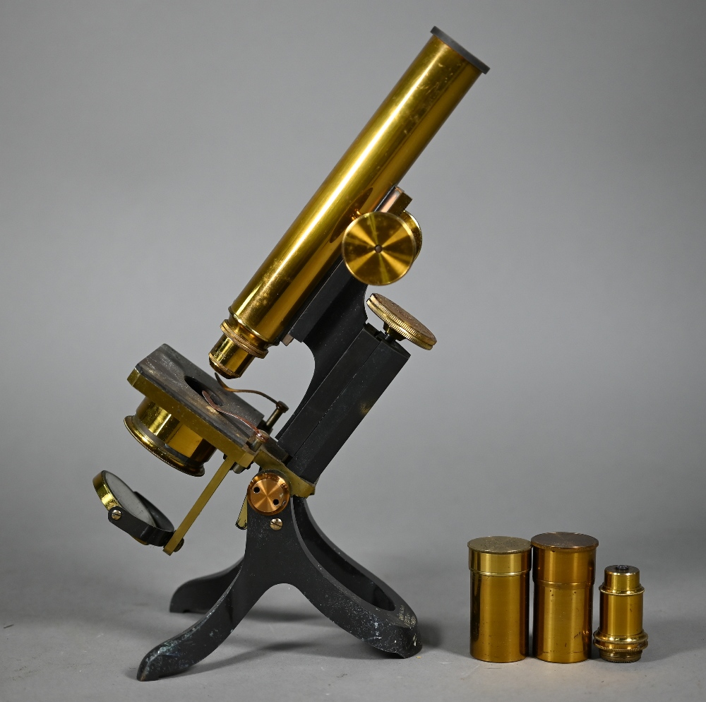 A lacquered brass microscrope by Henry Crouch, London, no 1494, in fitted case with optics and other