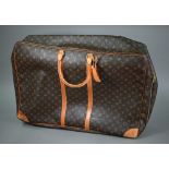 Louis Vuitton - A canvas suitcase travel bag with leather trimmings, serial number SP0977