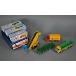 A boxed Dinky Toys Elevator Loader 564, lightly played-with, to/w three boxed Dinky Supertoys models