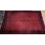 An old Persian-Kurd Uzbek Hoten design rug, red, 242 cm x 149 cm