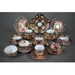 Three Royal Crown Derby Imari trios of tea cup, saucer and plate, to/w five other tea cups and