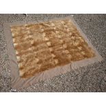 A fur travelling rug with felt border, 210 x 164 cm overall