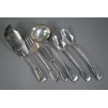 A matched set of Victorian silver fiddle and thread serving flatware, including soup spoon,