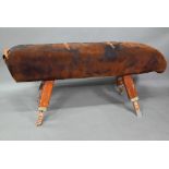 A vintage vault horse, suede covered on adjustable oak legs, approx. 174 cm long