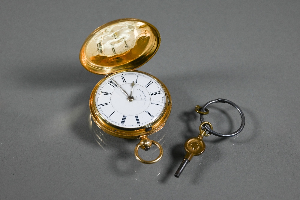 Thomas Russell & Son, 59179, an 18ct gold cased hunter pocket watch, heavilly chase engraved