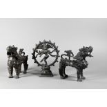 A pair of 20th century Tibetan bronze celestial Snow Lions, 14 cm high to/w a small Indian bronze