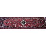 A contemporary North West Persian Hamadan runner, the red ground with multi-coloured garden