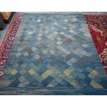 An old Turkish blue ground lattice design kelim, 320 cm x 253 cm