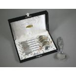 A cased set of six .830 grade coffee spoons with engraved diamond design on the stems, Brødrene