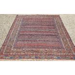 A vintage Moroccan geometric design Sumak weave Kelim carpet, multi-coloured bands within conforming