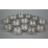 A set of fourteen US Sterling small pierced bowls, 6.5cm diameter, 9.6oz