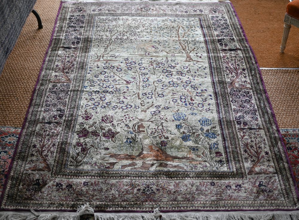 A fine old Persian silk Tabriz rug with tree of life design on camel ground, 220 cm x 146 cm