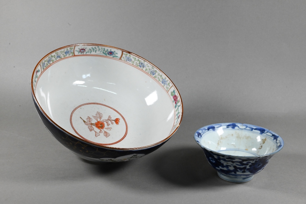 An 18th/ 19th century Chinese famille rose bowl painted with landscapes and pheasants within