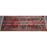 A contemporary North West Persian Tafresh rug, the dark blue ground with gelmetric symbols, birds,