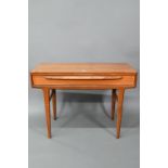 A scarce mid-century single drawer teak side table, designed by John Hubert and Alan Pledge for A
