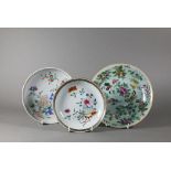 Two 18th century Chinese famille rose dishes, painted with floral designs in polychrome enamels,