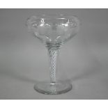 A large glass goblet with vine-etched bowl on airtwist stem, ground out pontil to base, 30 cm high x